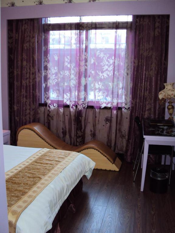 ونزهو Oasis Hotel الغرفة الصورة
