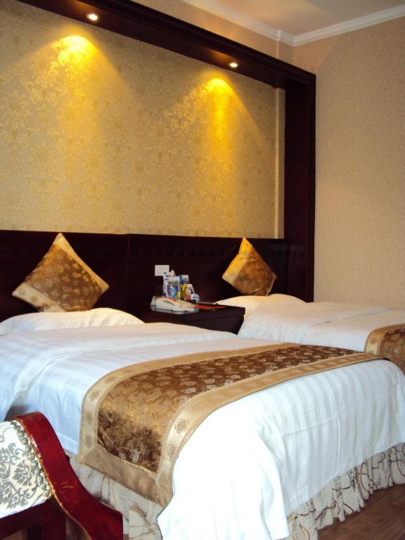ونزهو Oasis Hotel الغرفة الصورة